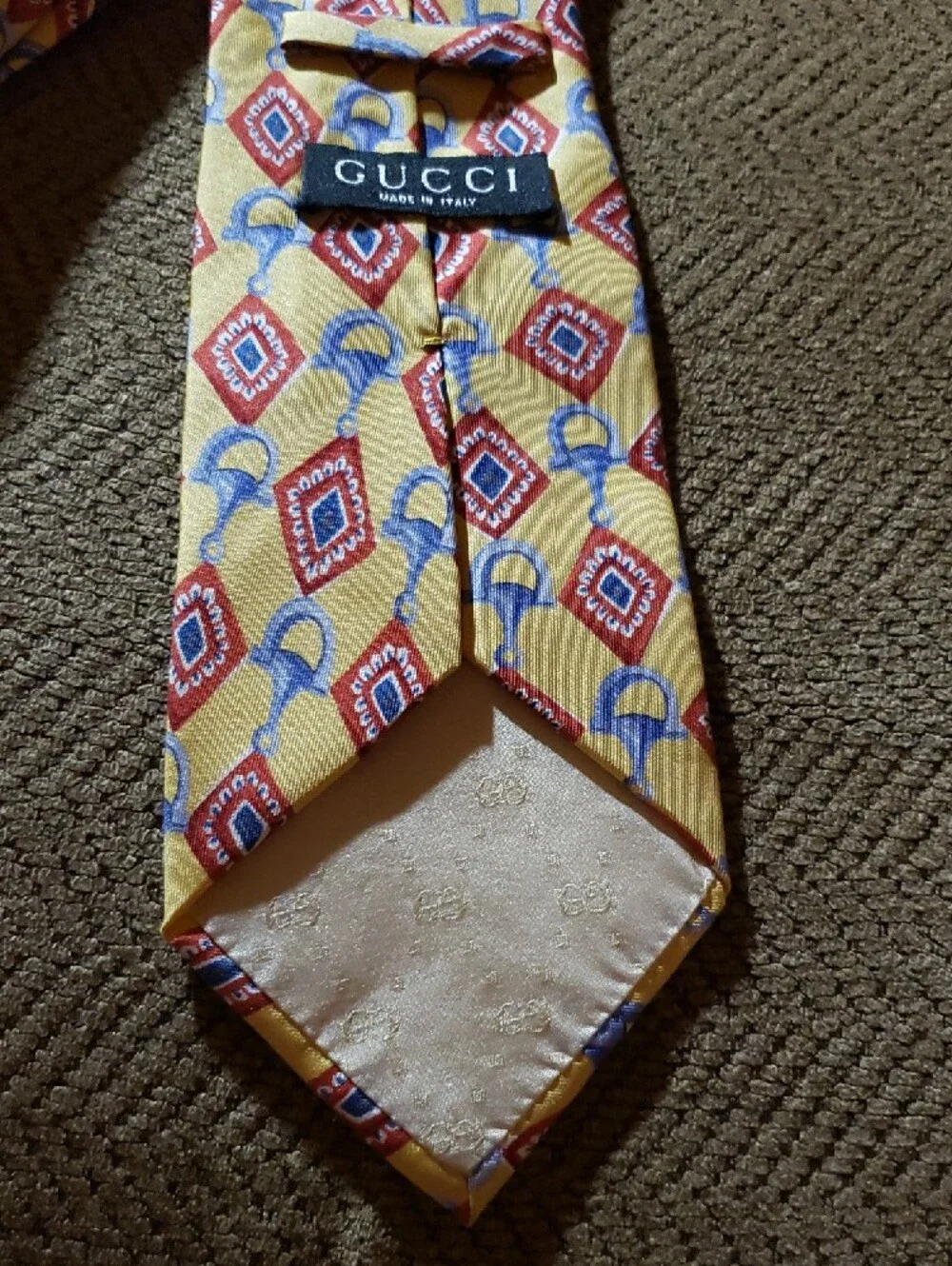 GUCCI Yellow Geometric Silk Tie with Red and Blue Motif